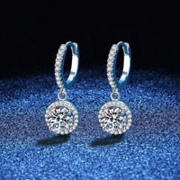 <tc>1ct ronde Moissanite oorbellen in 925 zilver</tc>