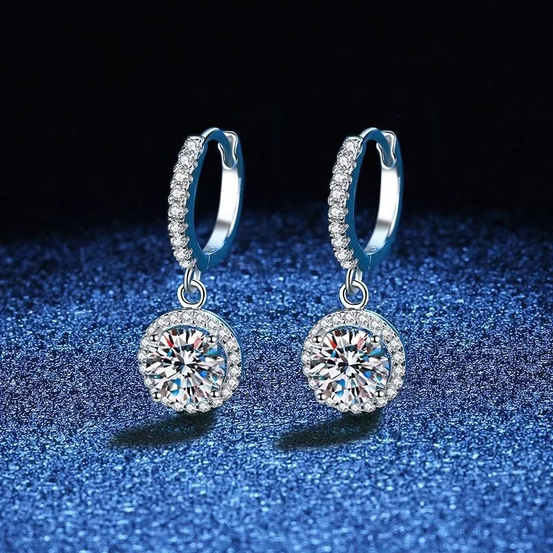 <tc>1ct ronde Moissanite oorbellen in 925 zilver</tc>