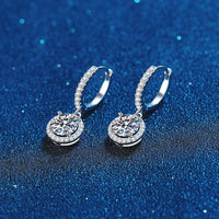 <tc>1ct ronde Moissanite oorbellen in 925 zilver</tc>