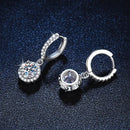 <tc>1ct ronde Moissanite oorbellen in 925 zilver</tc>