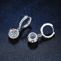 <tc>1ct ronde Moissanite oorbellen in 925 zilver</tc>