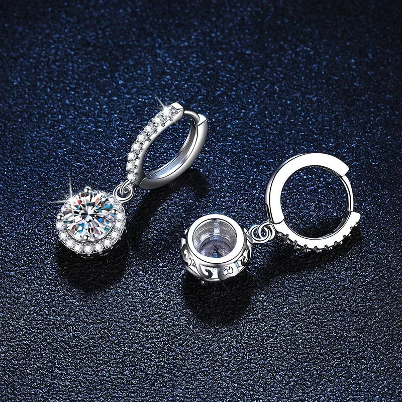 <tc>1ct ronde Moissanite oorbellen in 925 zilver</tc>