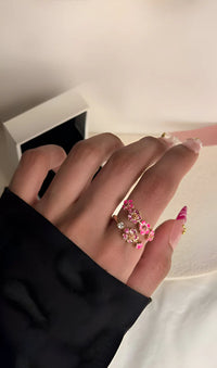 <tc>Delicate Bloemring met Roze en Witte Zirkonia</tc>